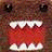 A 48x48 pixel animated contact sheet showing three sequential frames of a brown cartoon character with large white teeth and red mouth interior, displayed in a 2x2 grid layout with one empty gray cell.