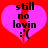 Two identical pink hearts on red background with black text 'still no lovin :'(.'
