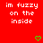 Red background with repeated white text "im fuzzy on the inside" and green pixelated hearts in a pattern