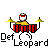 Pixel art of a cartoon character with red-and-white striped head, yellow shirt, and white pants playing drums on red drum set with yellow cymbals.