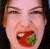 A split-screen image with a person's face on the left and green text on a dark background on the right.