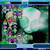 Pixelated static image of a figure with green skin, purple flowers on head and chest, holding a white cloud-like object against dark background.