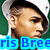 Pixelated image of a person wearing white cap and dark hair, with overlaid text in blue, pink, and green.
