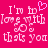 Pixelated pink background with white text reading "I'm in love with that you" and a small purple heart symbol, displayed as two identical side-by-side