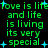 Green pixelated text repeats 'love is life and life is living its very special' with blue star symbols on a black background.