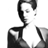 Static grayscale buddy icon of a stylized human figure with exaggerated proportions and simplified features, rendered in low-resolution pixel art style against white background.