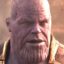 Static 64x64 pixel icon showing a close-up of a bald man's face with visible wrinkles and facial features, rendered in low-resolution pixels with muted tones.