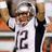 Pixelated image of a football player in white jersey with number 12, raising arms, next to text claiming Tom Brady is a beast.