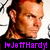 Pixelated portrait of a person with light brown hair and fair skin, wearing a dark shirt, with purple text reading 'J0ttHardy' and a heart symbol below.