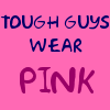 Static image with pink background displaying three lines of text: 'TOUGH GUYS' in dark blue, 'WEAR' in dark blue, and 'PINK' in magenta.