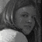 A grayscale of six showing a woman with long hair in various poses, overlaid with colored text fragments