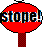 Red circular stop sign with black border and red checkered pole, displaying 'STOP!' text in glitched multicolor pixels.
