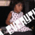 A child in a white sleeveless dress with pink patterns holds a white object while seated, viewed from multiple angles.