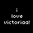 Black background with white pixelated text reading 'i love victoriaa!' in two identical vertical