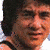 A 2x2 contact sheet of a pixelated animated icon featuring two images of Jackie Chan and green text on yellow backgrounds, with one frame showing red background behind the second image.