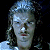 A split-frame contact sheet showing a pixelated character on the left and green text reading "Original Icons .com" on the right against a dark background.