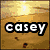 Animated sequence of five beach scenes with palm trees and sunsets, each displaying the text 'casey' in bold white letters with black outline.