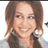A static image shows a person with brown hair and large earrings, alongside pink text reading "Miley Is My Shining Super Star" on white and gray backgrounds.