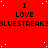 Red background with white dots, repeated text "I LOVE" above and below horizontal black text strings.
