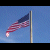 Animated contact sheet showing three sequential frames of a waving American flag on a pole against a blue sky background with visible vertical lines indicating animation transitions.