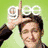 Six show people forming 'gee' with hands over heads against colored backgrounds, with one displaying red 'glee' text