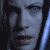 A pixelated animated sequence shows a person with long dark hair and blue eyes in three distinct poses against a dark background.