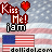 Pixelated static image featuring "Kiss Me!" text with a heart, an American flag, and "iam" in block letters against a blurred background.