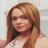 A pixelated image of a person with long light brown hair wearing a white sleeveless top, positioned next to text blocks on a split background.