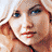 A 48x48 pixel animated contact sheet showing three sampled frames of a celebrity's face with blonde hair and blue eyes, arranged in a 2x2 grid with one empty gray cell.
