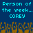 Pixelated blue background with cyan text reading "Person of the week... corey" repeated twice, and orange pixel art resembling flames or abstract shapes at the bottom.