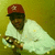 A person in a red cap and white jacket holds a baseball glove against a yellow background, with subtle pose changes across frames.
