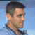 A pixelated contact sheet showing a side-profile of a man with short dark hair against a light blue background on the left, and green text reading "Original Icons .com" on a solid dark green background on the right.