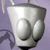 A pixelated grayscale icon of a white ceramic cup with two rounded protrusions on its side, set against a light purple background.