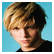 A 54x54 pixel animated contact sheet showing two frames of a buddy icon: left frame features a person with blonde hair against a blue background, right frame displays text "Mrs. Jesse McCartney" on the same blue background.
