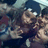 Pixelated image of a person with dark hair and light skin on left, red text "Party" top right, "of the" bottom left, "YEAR=]" bottom right against bright blue background.
