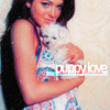 A woman with long dark hair wearing a sleeveless patterned top holds a small white dog against a light textured background with overlaid text.
