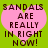 A static image shows a pink heart on a green background with pixelated text reading "SANDALS ARE REALLY IN RIGHT NOW!" in dark brown letters.