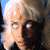 Pixelated image of a person with light hair and dark clothing on left, green background with bright green text 'Original Icons .com' on right.