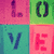 Four distinct pixel art images arranged in a : colorful 'LOVE' letters, hands forming a heart over clouds, two dinosaurs with a pink heart, and an empty gray square