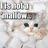 A pixelated cat with a pink nose and black eyes appears in two side-by-side frames, each displaying the text "I'm not a real cat" above its head.