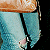A pixelated close-up of a person's lower torso wearing light blue denim pants with a prominent vertical black tear on the right leg, set against a solid black background.