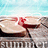 Pixelated beach scene with two people kissing on a wooden deck, overlaid with pink text phrases on white and gray backgrounds.