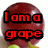 A red grape with green leaves and a stem, displaying text changes across four