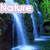 Pixelated waterfall scene with green foliage and blue water, featuring three text overlays: 'Nature' in light purple, 'Is' in white on red, and 'Beautiful' in white on green.