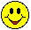 Yellow circular icon with black oval eyes and red mouth showing a smiling expression, transitioning through of swirling motion