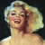 Pixelated image of a smiling woman with blonde hair against dark background, next to green text reading Original Icons .com.