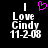 Black background with white text reading "I Love Cindy 11-2-08" and a pink pixelated heart symbol above the text in the left view, while the right view lacks the heart symbol.