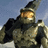Pixelated image of a character in green and brown armor with a helmet, holding a weapon against a light blue background.