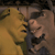 Animated sequence showing two cartoon characters in a close interaction, one with a yellow garment and the other with a dark outfit, transitioning from a side view to a front view.