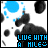 A 3x3 grid of animated frames showing a black-and-white cow pattern with blue circular highlights and changing text at the bottom, each frame displaying variations of "LIVE WITH A SMILE" in pixelated font.